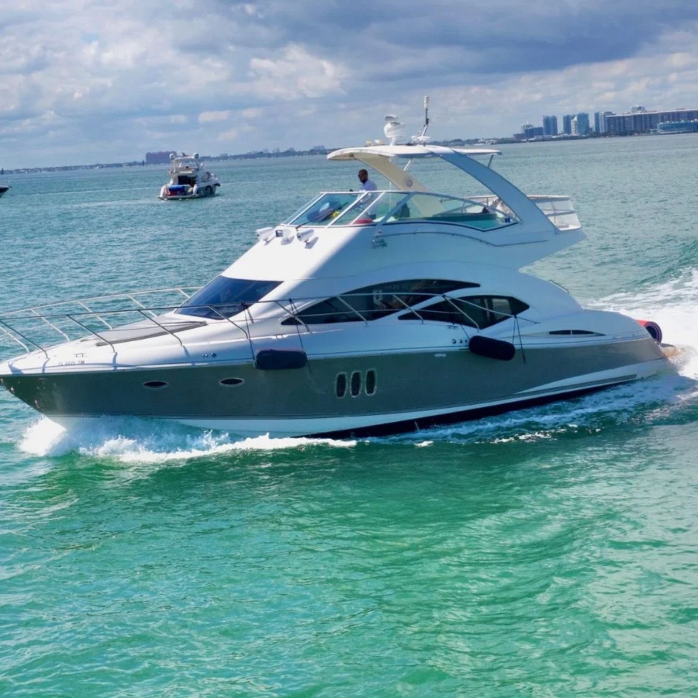 Flybridge yacht cruising Biscayne Bay