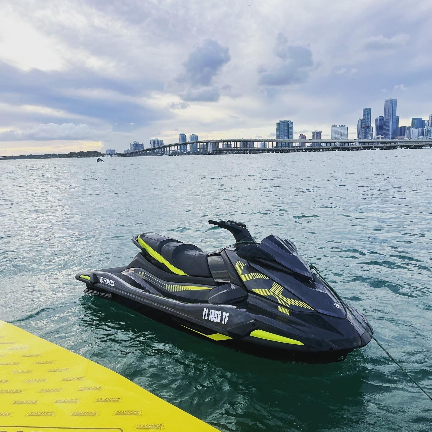 Jet ski on Biscayne Bay with the Miami skyline