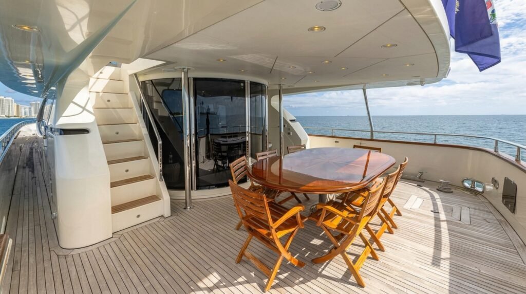 Aft deck dining table on the Azimut 105' Bearpaw yacht