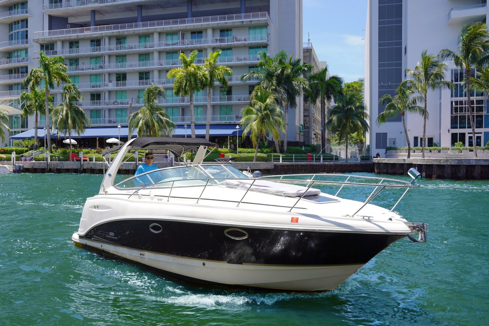Chaparral Signature 34' cruising past Miami waterfront towers