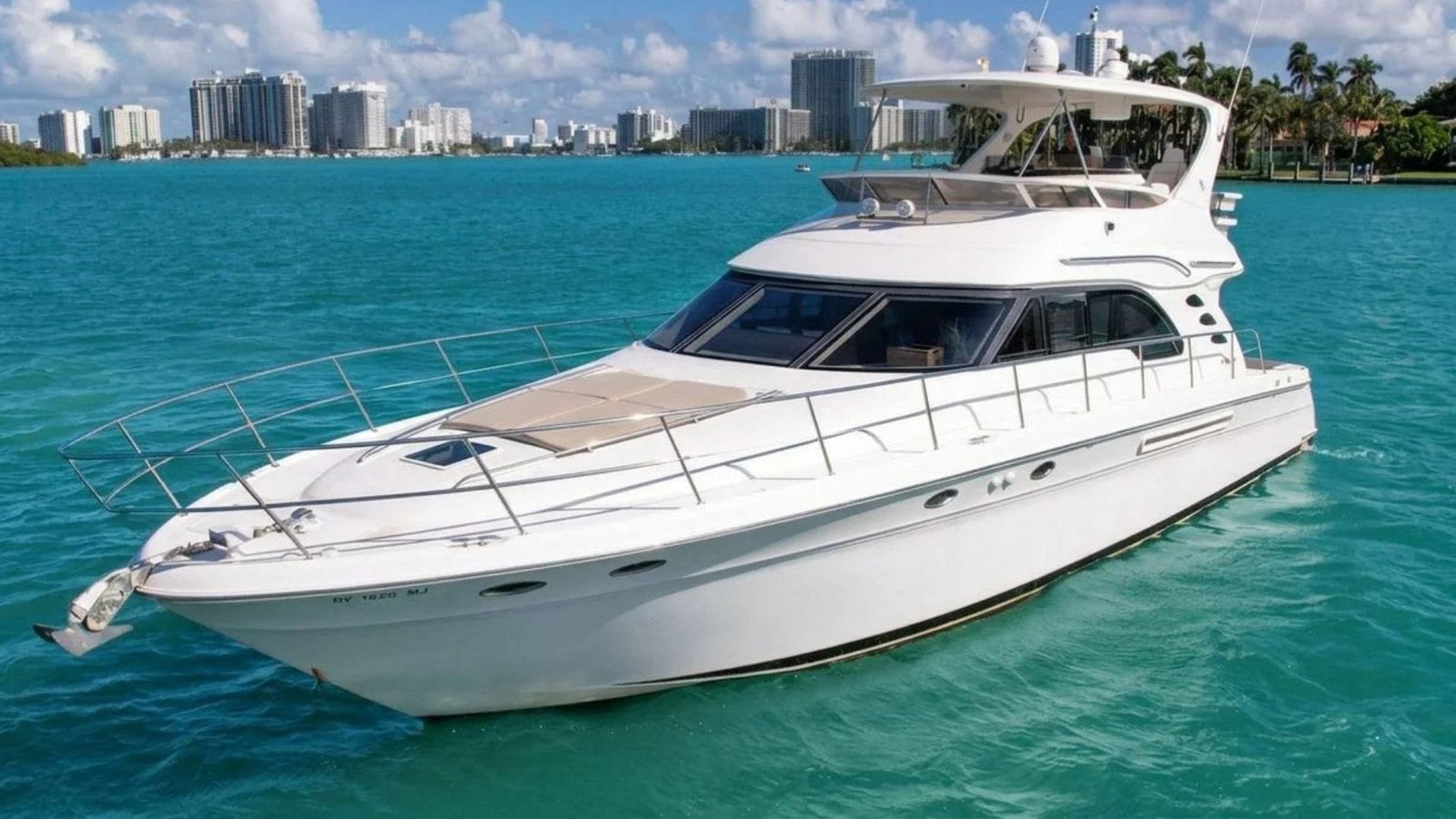 Sea Ray flybridge yacht cruising Biscayne Bay