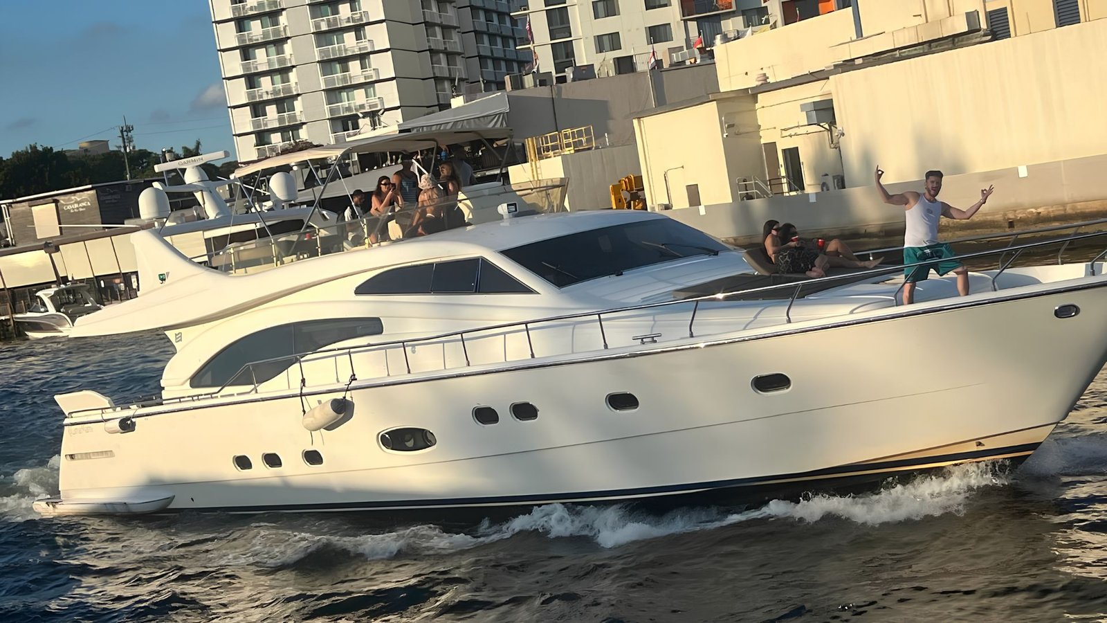 80' Ferretti Lumar cruising a Miami waterway